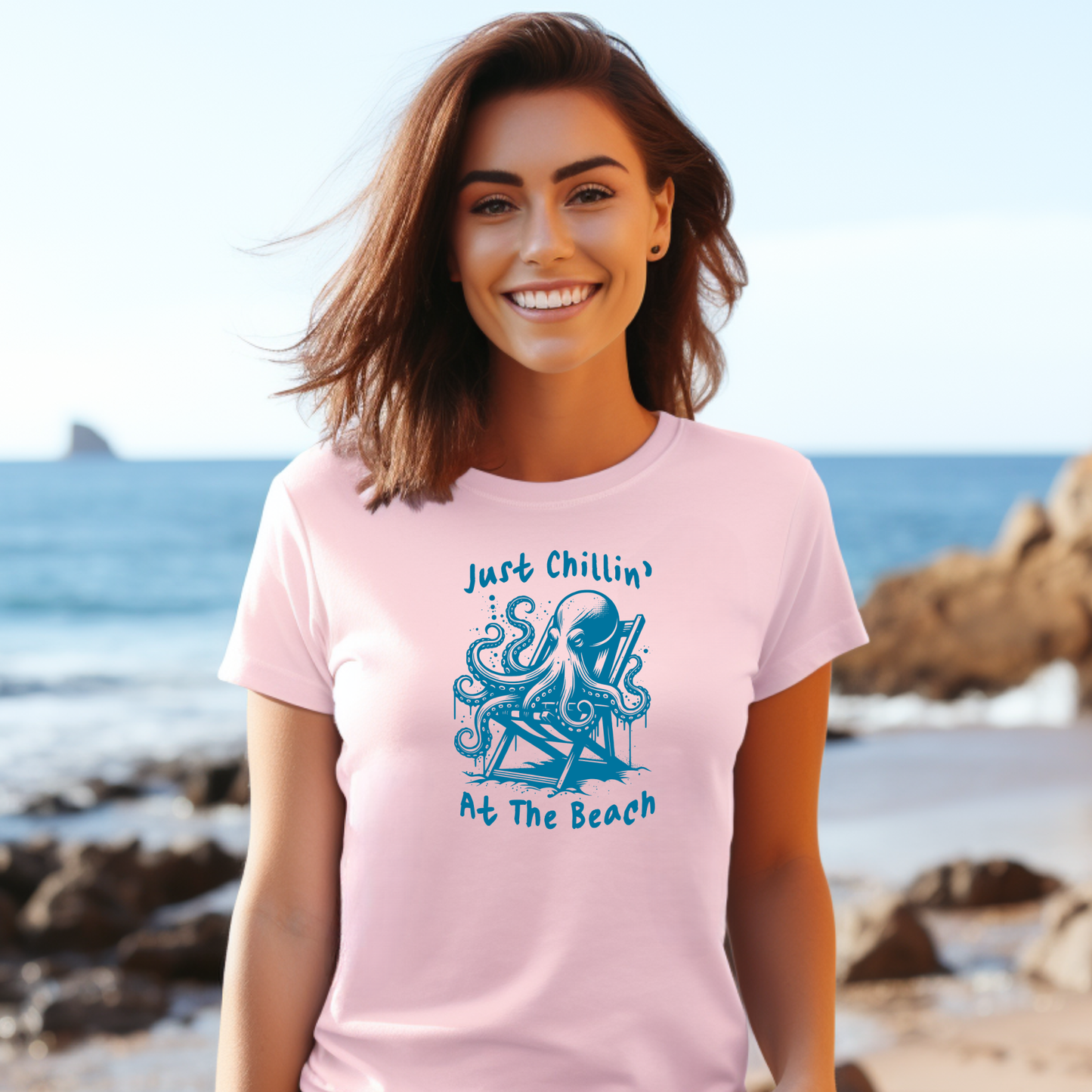 Gildan 5000 "Just Chillin' At The Beach" t shirt with an octopus setting in a beach chair in one color graphics. Picture of a girl standing on the beach wearing a t shirt.
