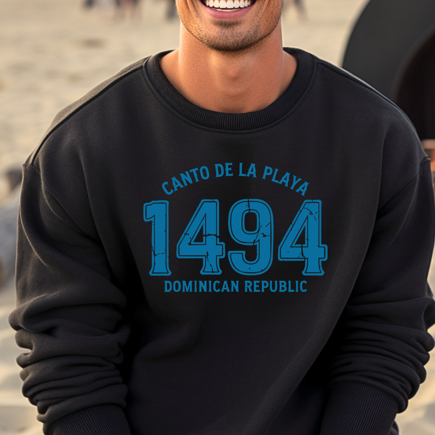Gildan sweatshirt with “Canto De La Playa 1494 Dominican Republic” printed in distressed navy text. Vintage beach-inspired crewneck symbolizing Caribbean heritage and coastal charm. Made from soft cotton-poly blend fabric for comfort and style, ideal for beach lovers and travelers who adore Dominican culture. Cozy, sustainable, and perfect for casual wear or tropical getaways.