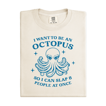 Folded t-shirt with blue octopus graphic and text on a white background