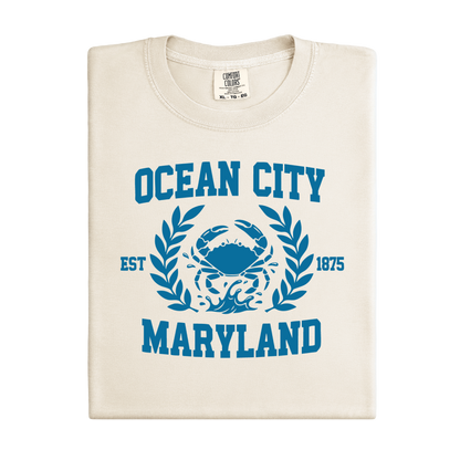 Folded t-shirt with 'Ocean City, Maryland' design on a white background