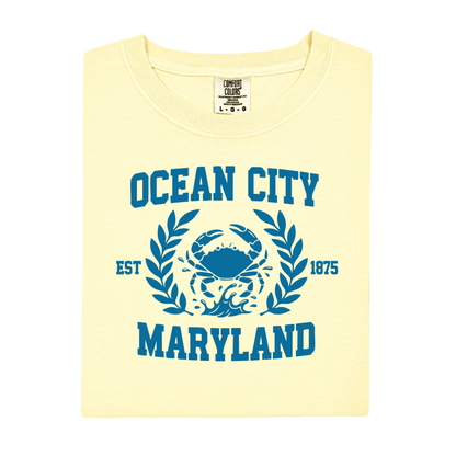 Yellow t-shirt with blue graphic and text 'Ocean City, Maryland' on a white background