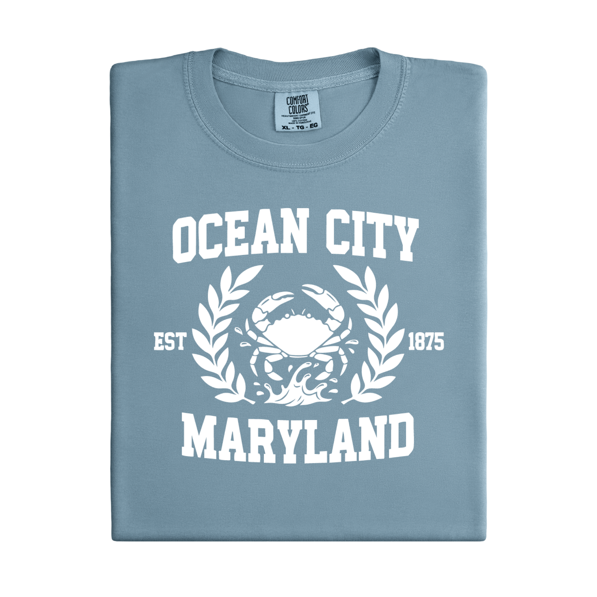 Folded ice blue t-shirt with 'Ocean City, Maryland' text and crab graphic on a white background