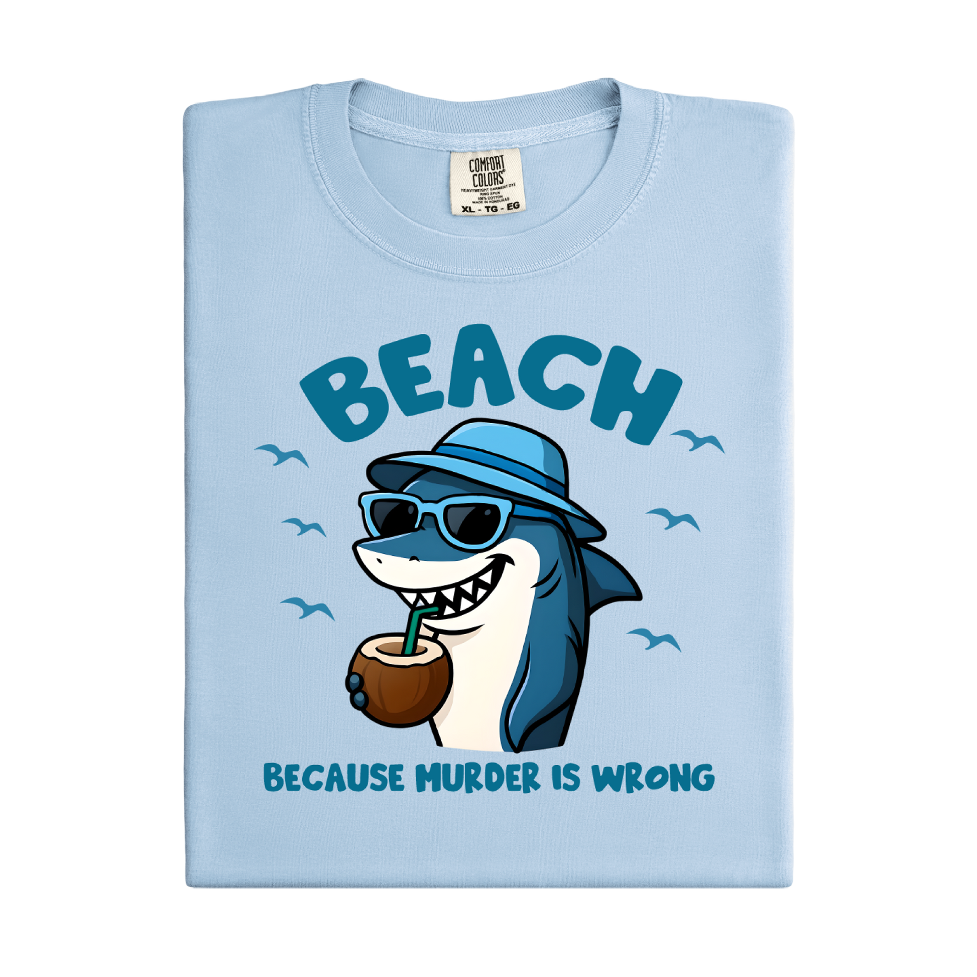 Light blue t-shirt with a cartoon shark design and text on a white background