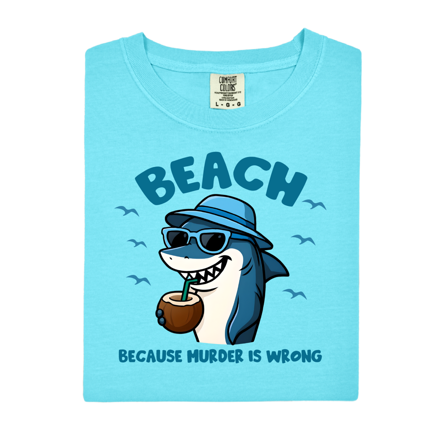 Light blue t-shirt with a shark graphic and text on a white background