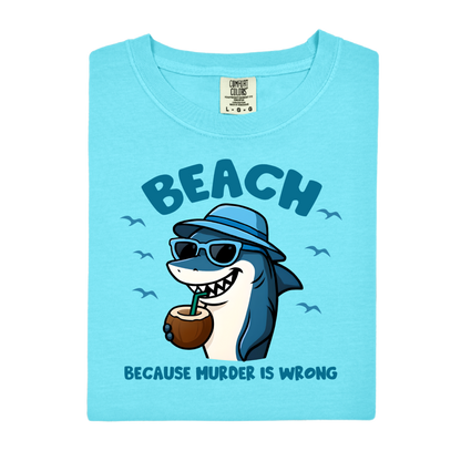 Light blue t-shirt with a shark graphic and text on a white background