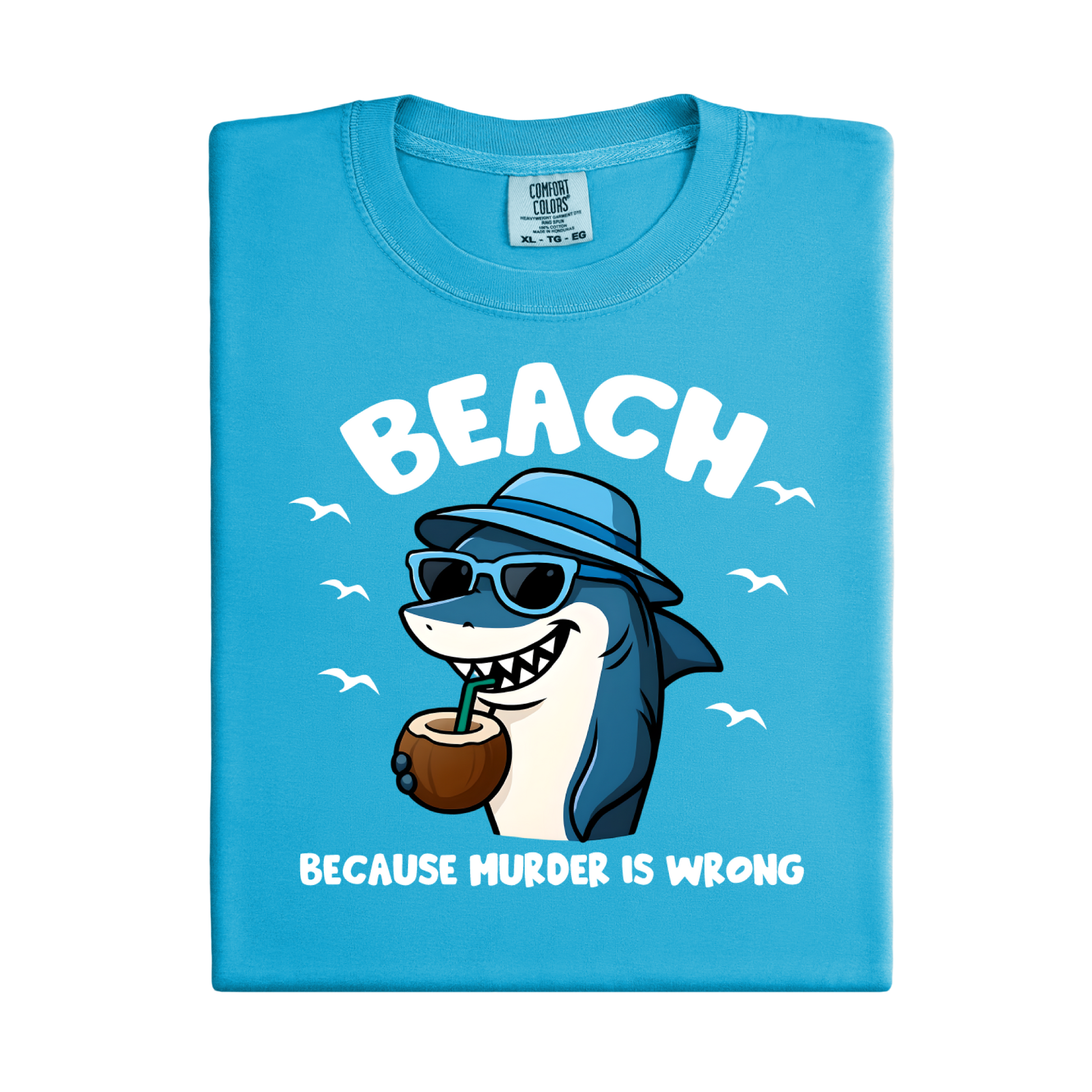Blue t-shirt with a shark graphic and text on a white background