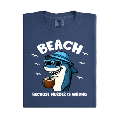 Navy blue t-shirt with a cartoon shark design and text on a white background