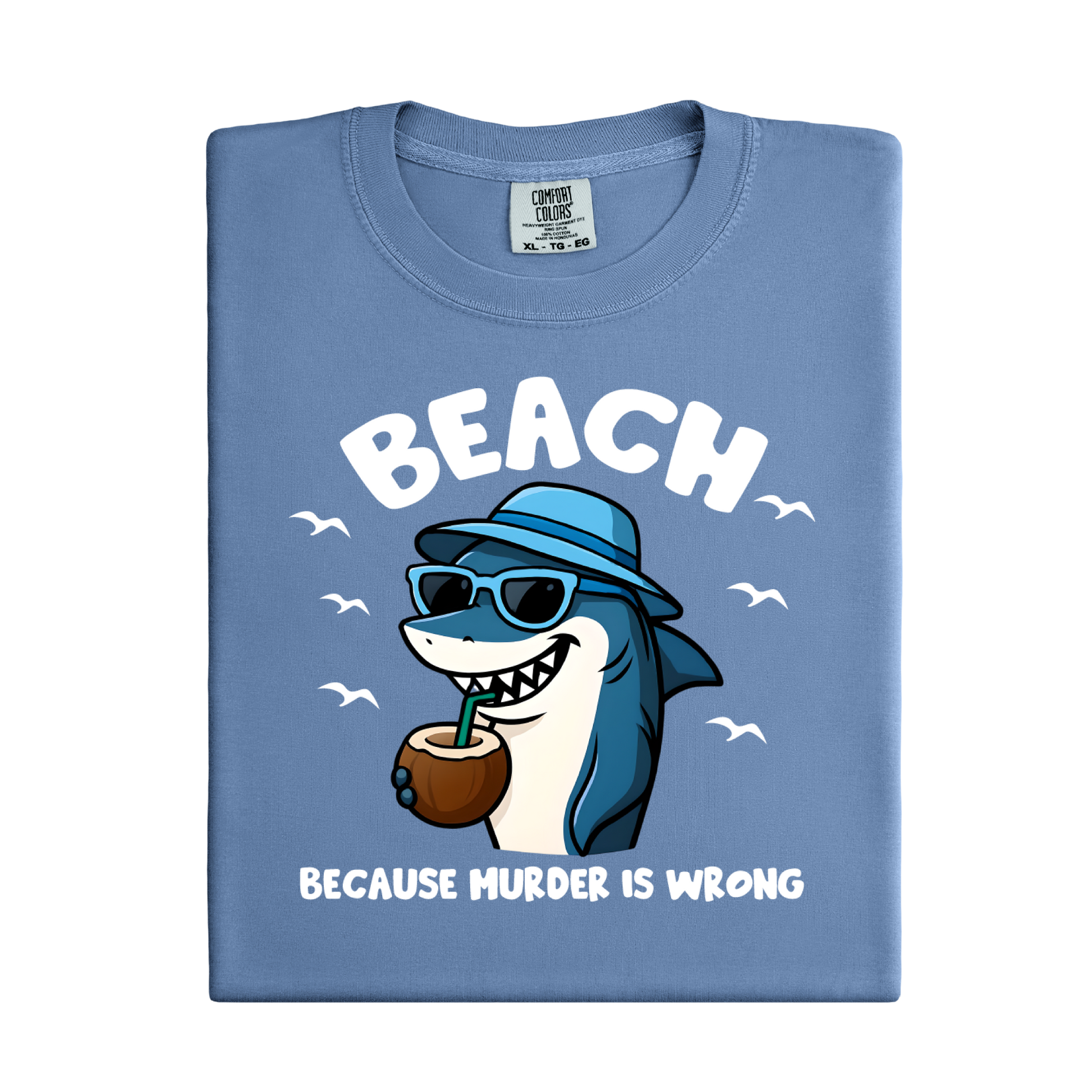 Folded blue t-shirt with a shark graphic and text on a white background