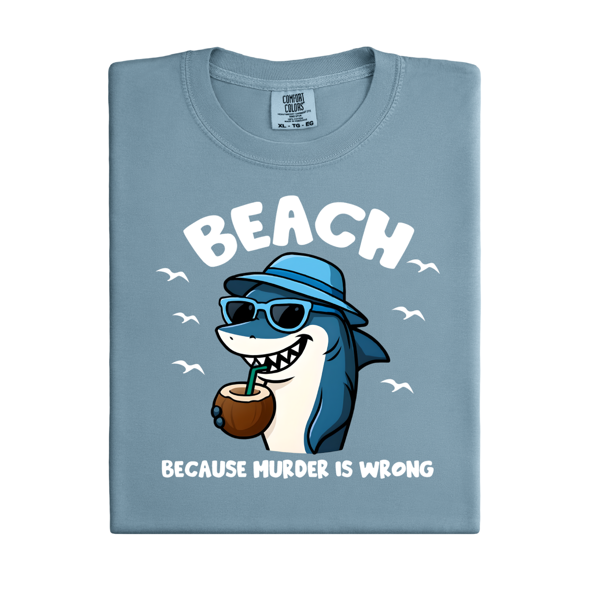 Light blue t-shirt with a shark graphic and text on a white background