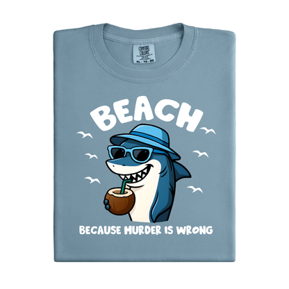 Light blue t-shirt with a shark graphic and text on a white background