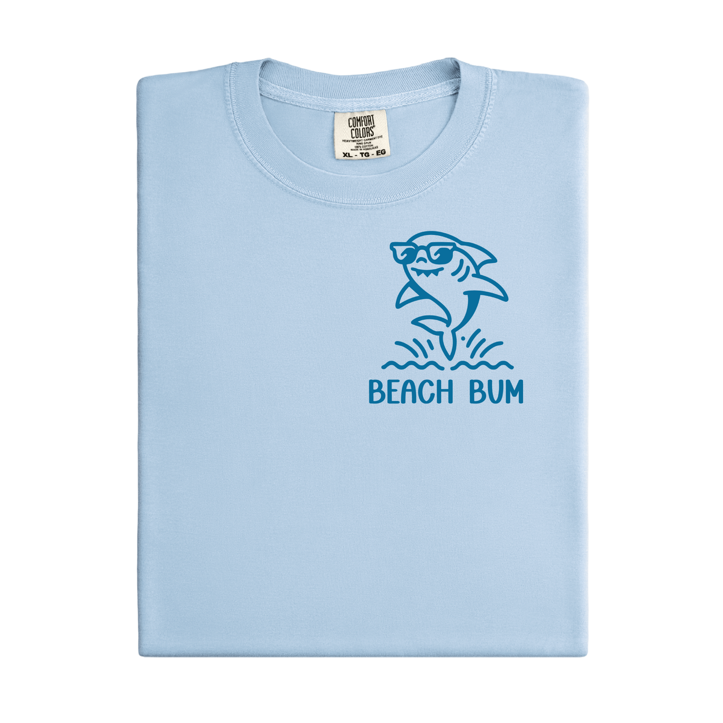 Light blue t-shirt with shark graphic and 'Beach Bum' text on a white background