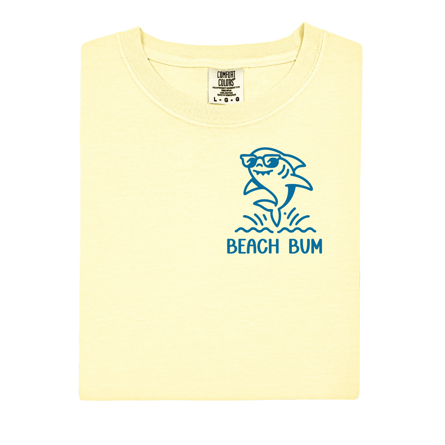 Yellow t-shirt with a blue shark graphic and 'Beach Bum' text on a white background