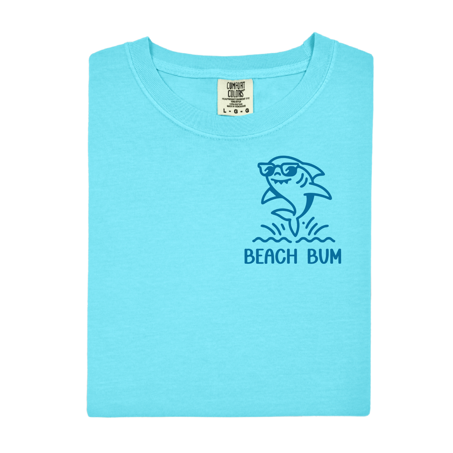Light blue t-shirt with a shark graphic and 'Beach Bum' text on a white background
