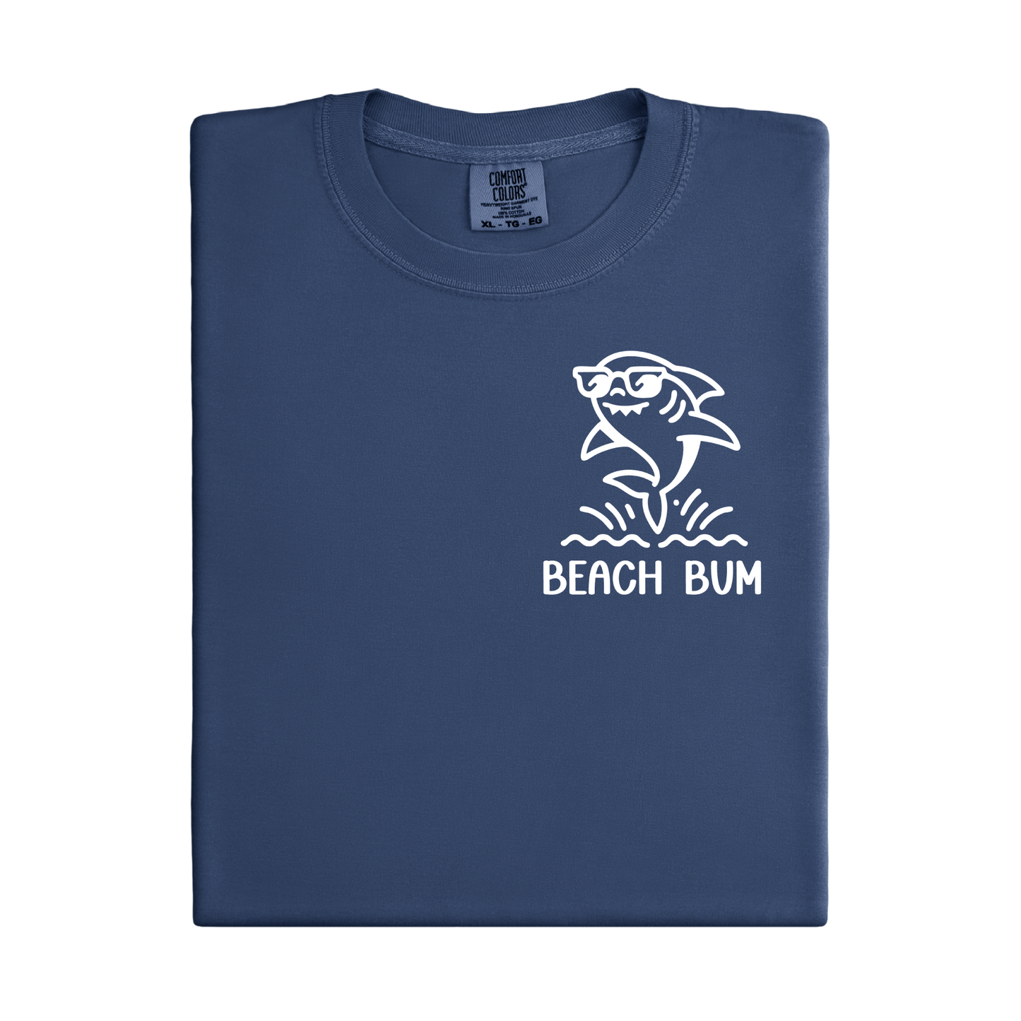 Navy blue t-shirt with a white shark graphic and 'Beach Bum' text on a white background