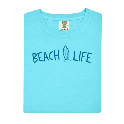 Lagoon blue t-shirt with 'Beach Life' text and surfboard graphic on a white background
