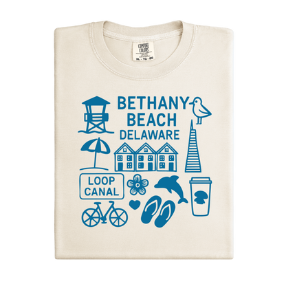 Beige t-shirt with blue graphics and text on a white background