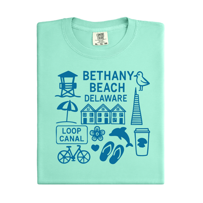 Mint green t-shirt with blue graphics and text on a white background