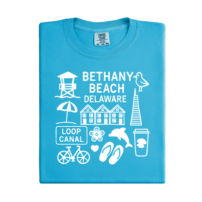 Blue t-shirt with white graphics and text about Bethany Beach, Delaware on a white background
