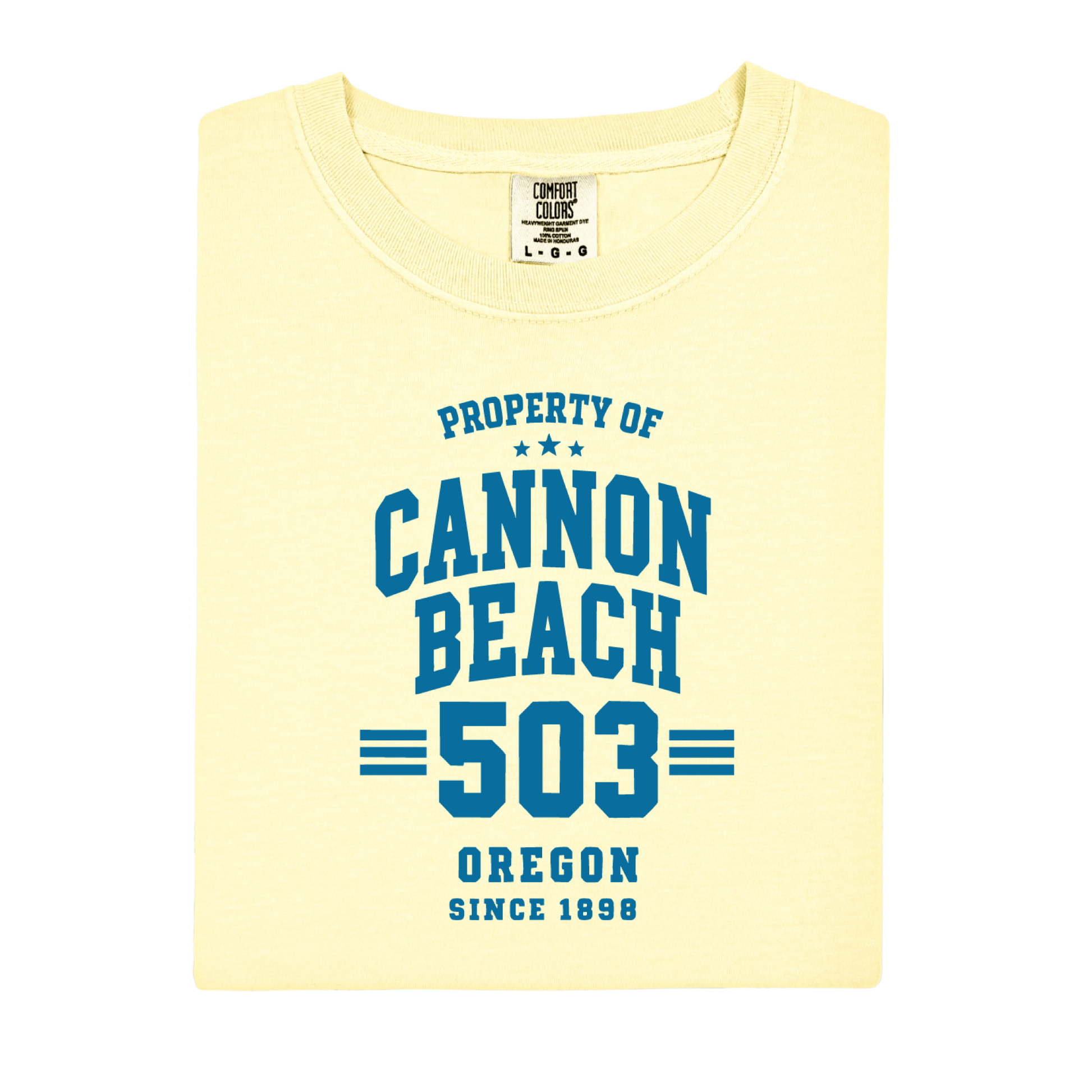Yellow t-shirt with blue text 'Property of Cannon Beach 503 Oregon Since 1896' on a white background
