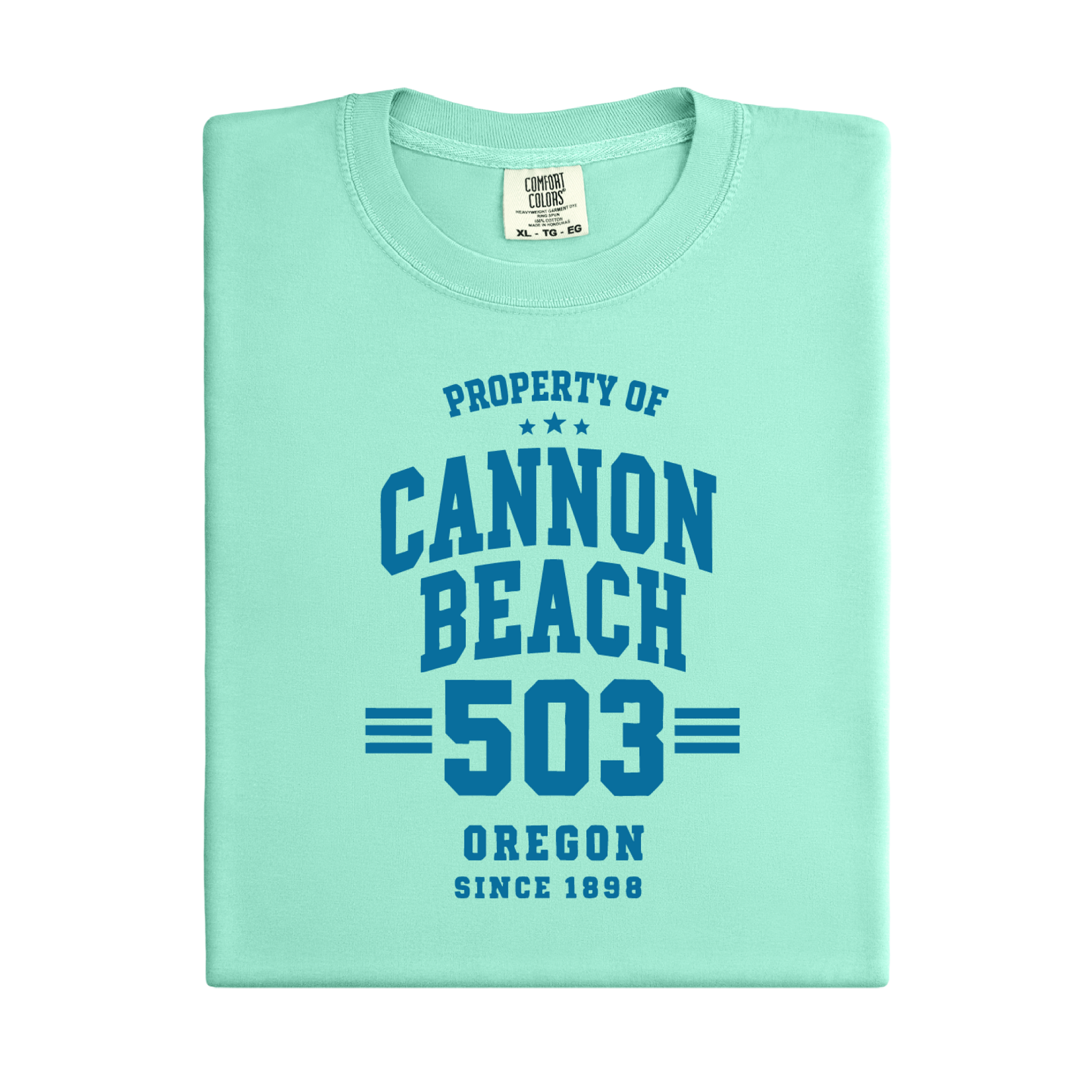 Light green t-shirt with 'Property of Cannon Beach 503 Oregon Since 1898' text on a white background
