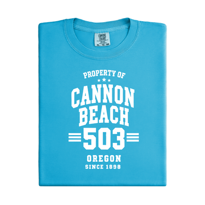 Folded blue t-shirt with white text on a white background