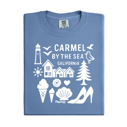 Folded blue t-shirt with white graphics and text on a white background