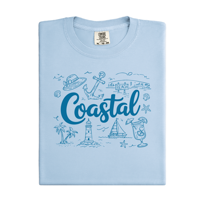Light blue t-shirt with coastal design and 'Coastal' text on a white background