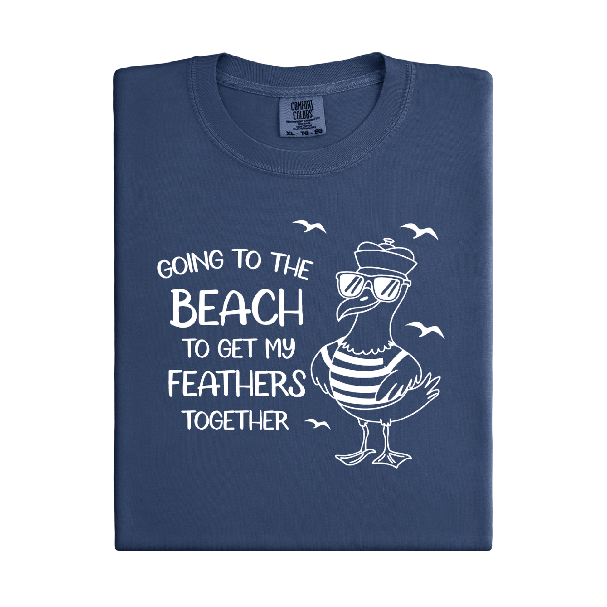 Comfort Colors t-shirt featuring a humorous blue seagull graphic wearing sunglasses and a striped shirt, beside the text “Going to the Beach to Get My Feathers Together.” Several flying birds surround the design, adding a fun coastal feel. This unisex garment-dyed tee offers a soft, vintage texture and relaxed fit, perfect for beach lovers, ocean fans, and anyone who enjoys playful summer graphic shirts.