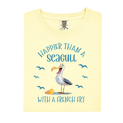 Yellow t-shirt with a seagull graphic and text on a white background