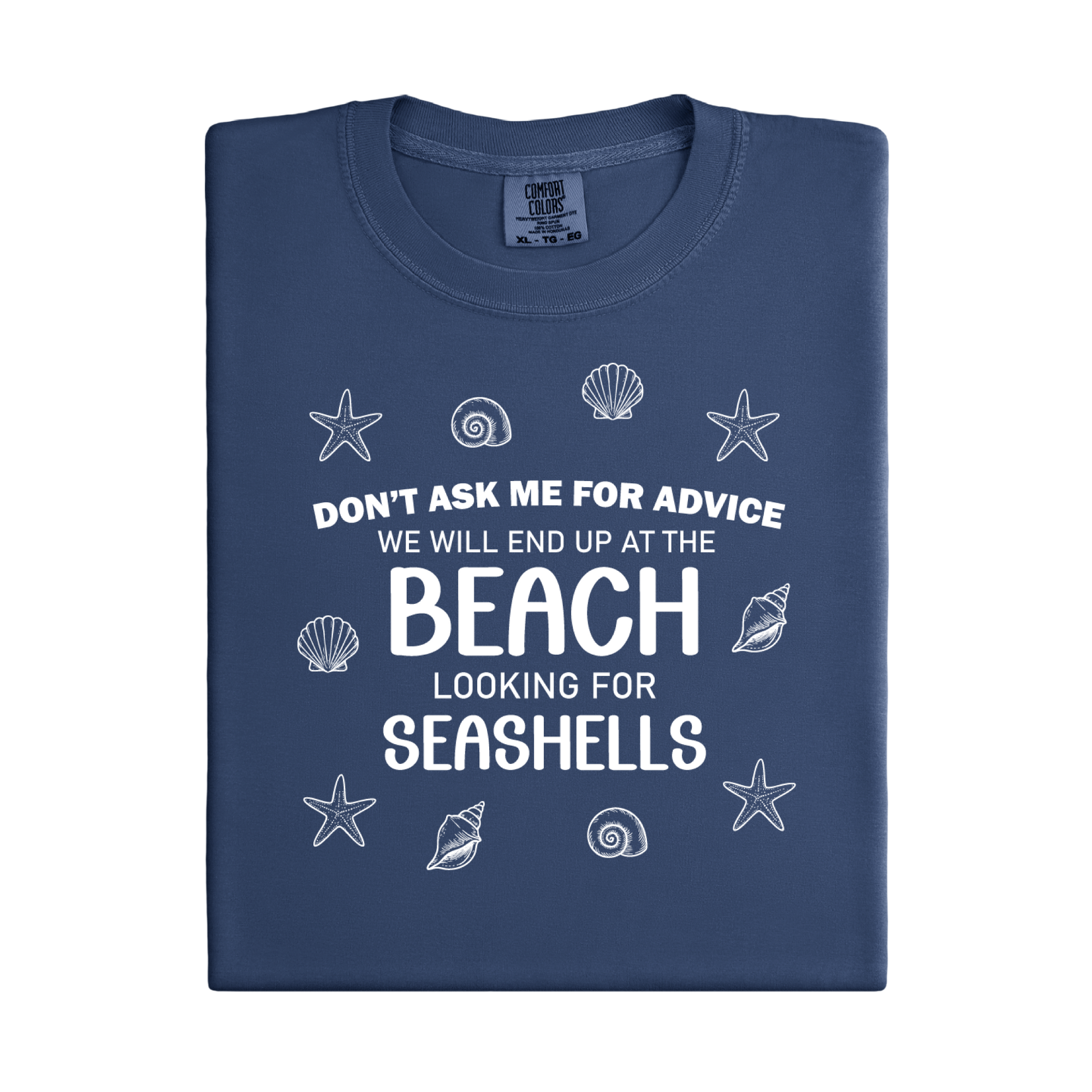 Folded navy blue t-shirt with beach-themed text and graphics on a white background