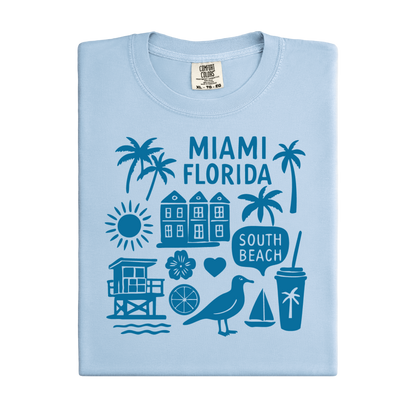 Light blue t-shirt with blue Miami Florida graphics on a white background