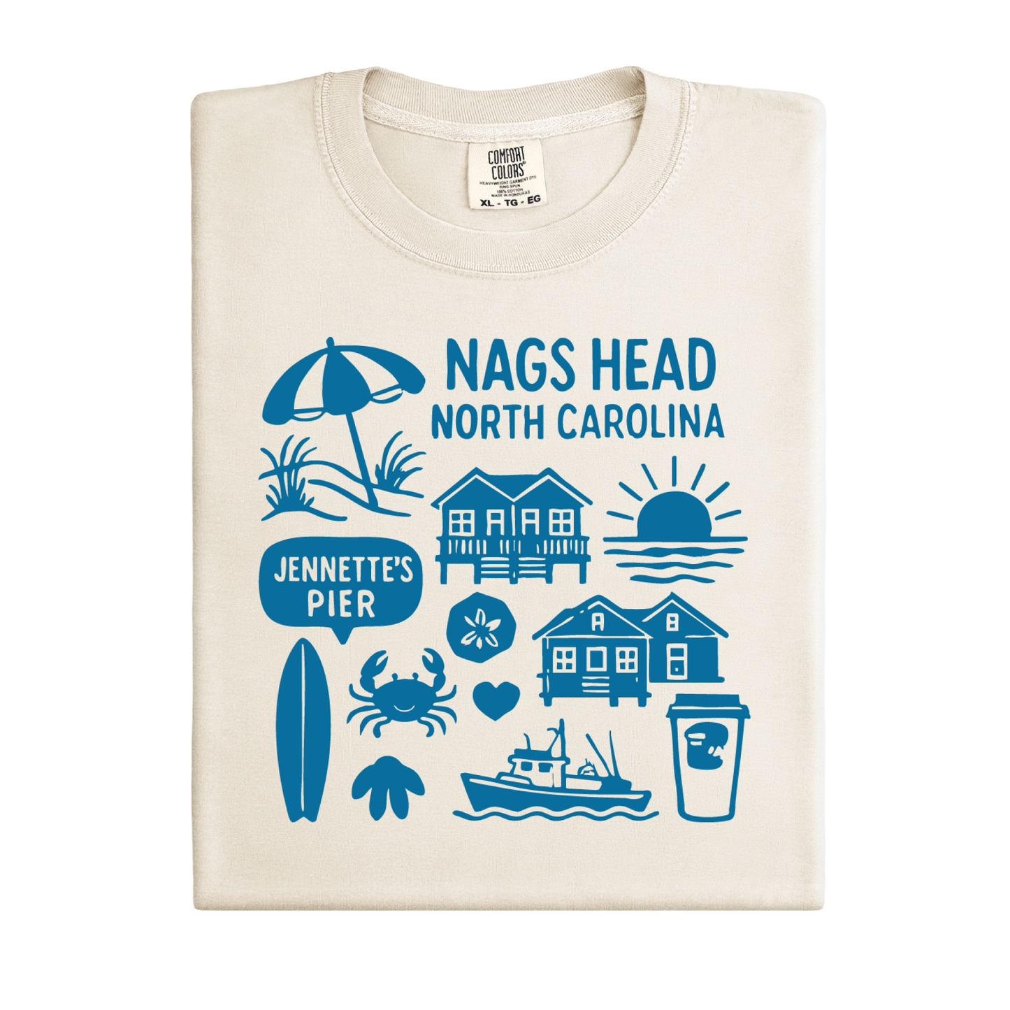 Beige t-shirt with blue coastal graphics and text on a white background