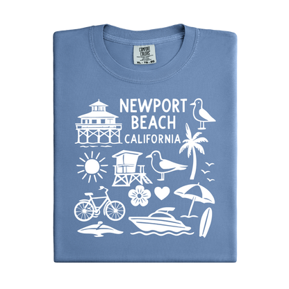 Folded blue t-shirt with white Newport Beach California graphics on a white background