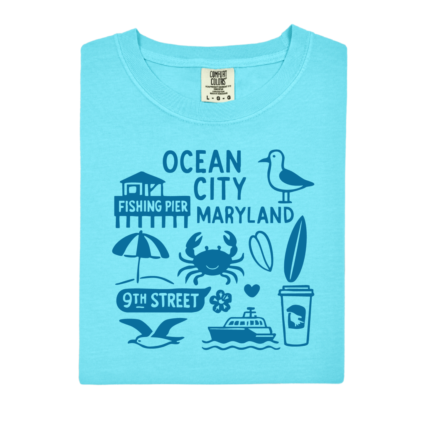 Light blue t-shirt with Ocean City, Maryland-themed graphics on a white background