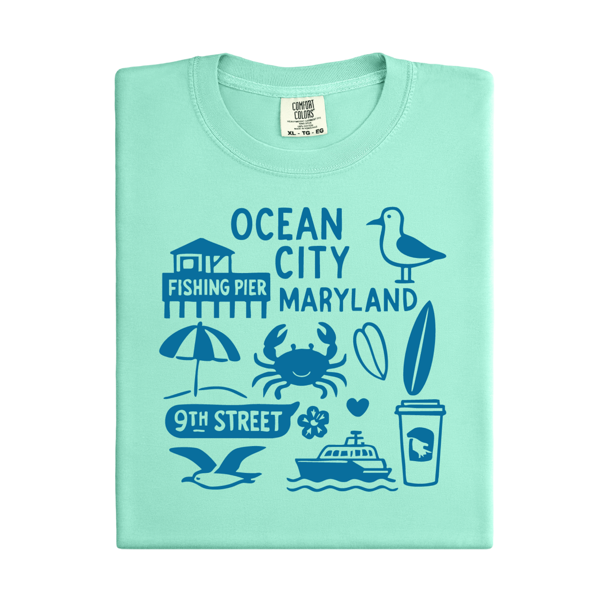 Light green t-shirt with Ocean City, Maryland-themed graphics on a white background