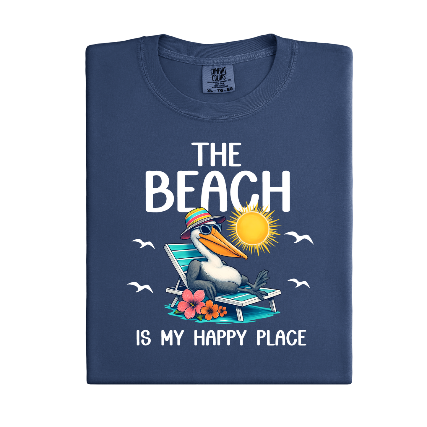 Folded navy blue t-shirt with a beach-themed design featuring a pelican and text on a white background.