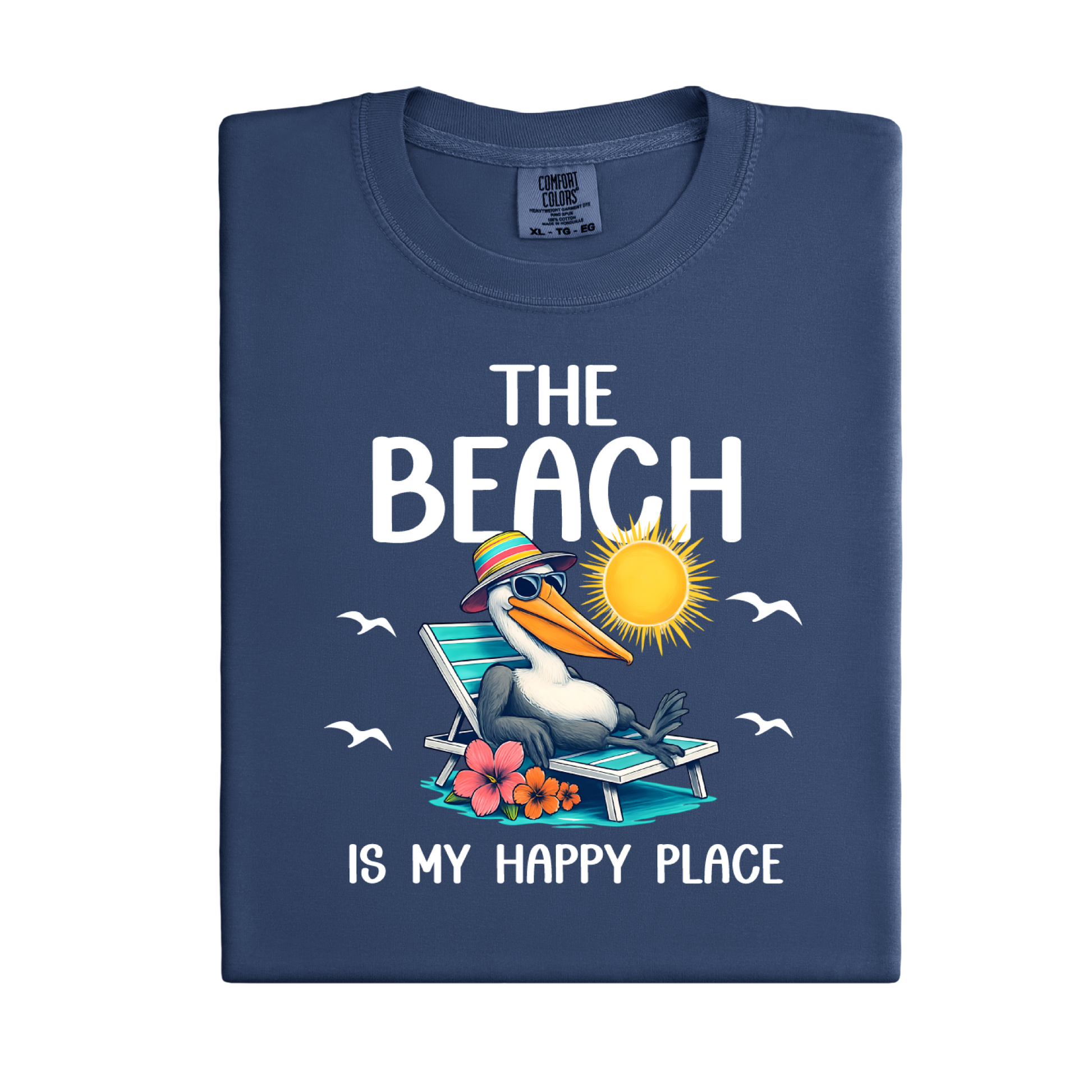 Folded navy blue t-shirt with a beach-themed design featuring a pelican and text on a white background.