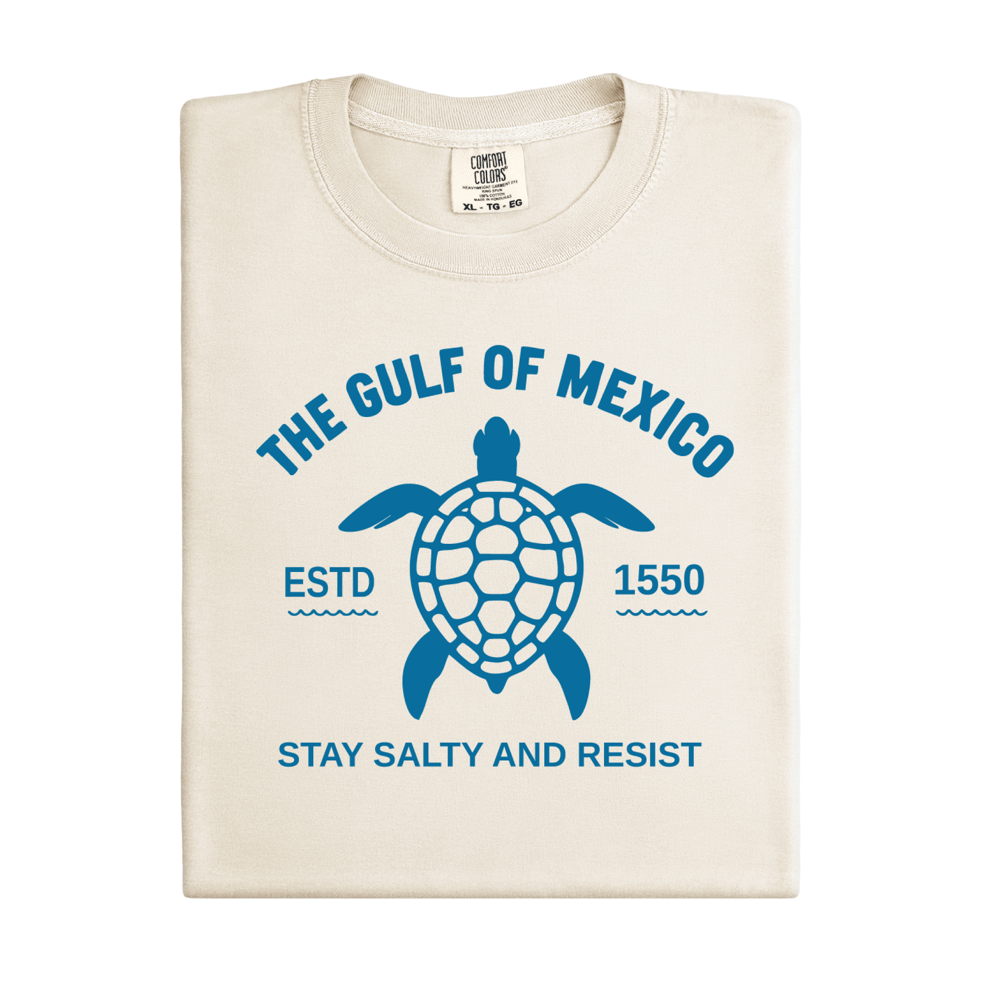 Beige t-shirt with blue turtle graphic and text on a white background