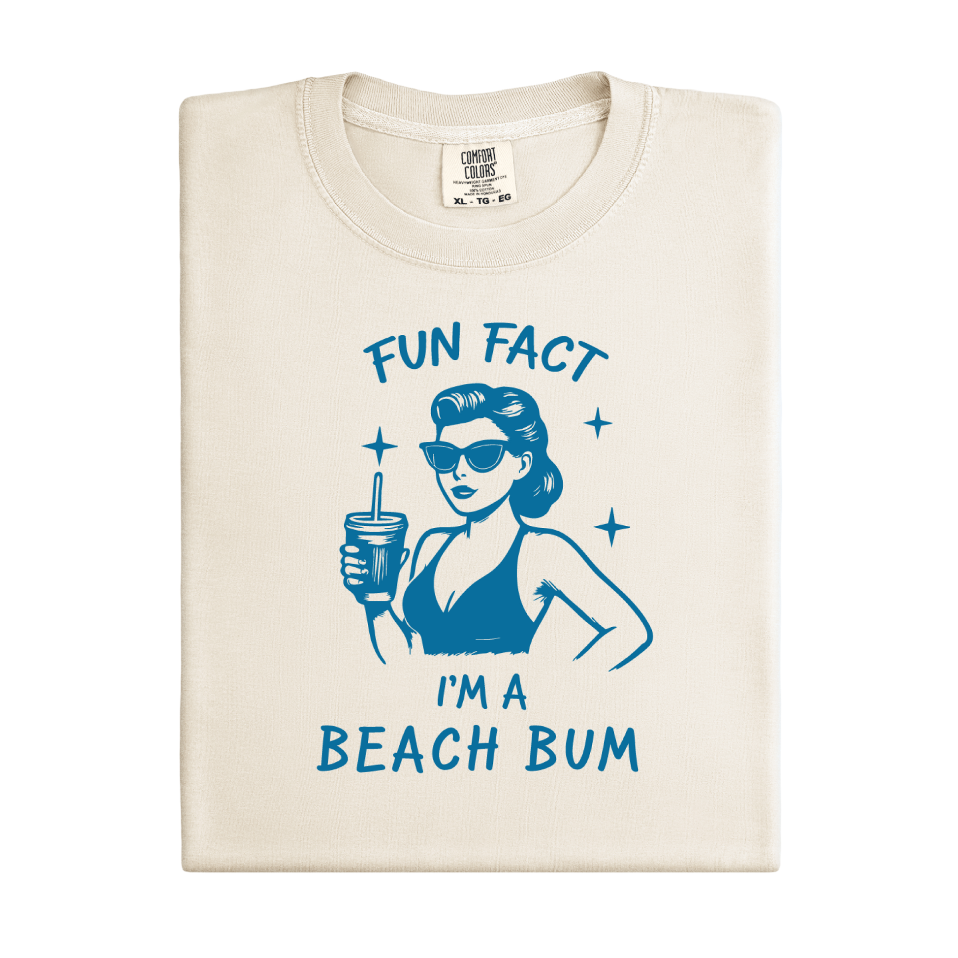 Folded t-shirt with a graphic of a woman at the beach and text 'Fun Fact I'm a Beach Bum' on a white background.
