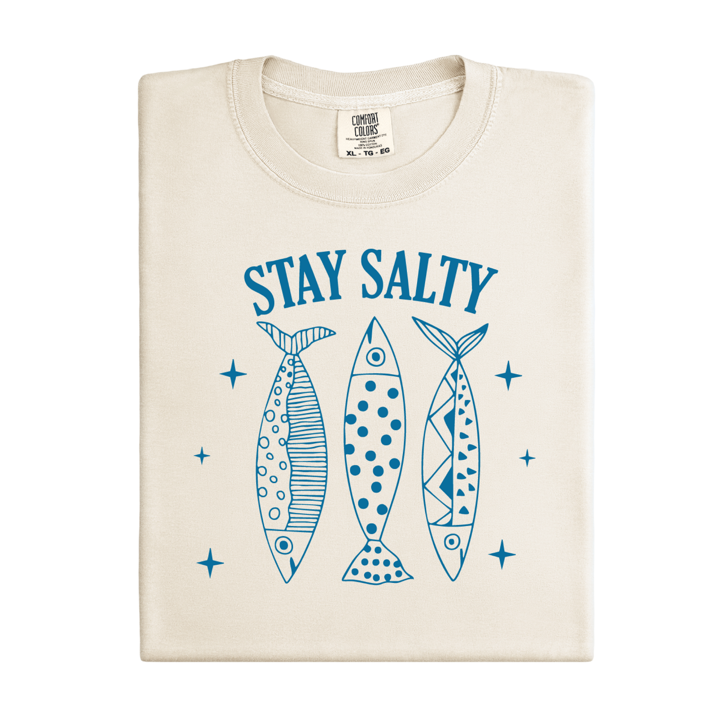 Beige t-shirt with blue graphic of three fish and 'Stay Salty' text on a white background