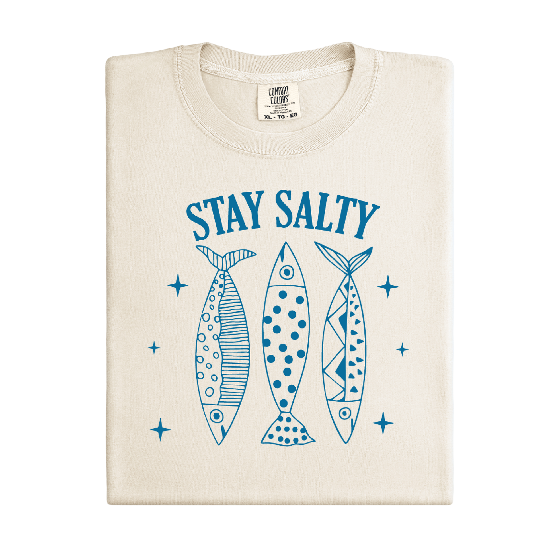 Beige t-shirt with blue graphic of three fish and 'Stay Salty' text on a white background