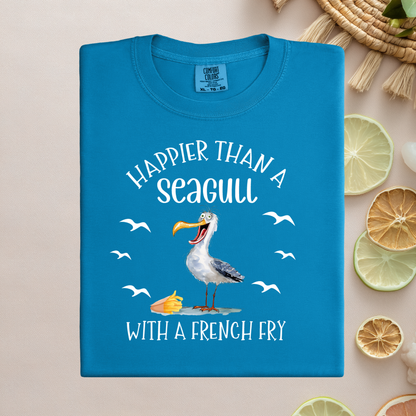 Blue t-shirt with a seagull graphic and text on a beige background