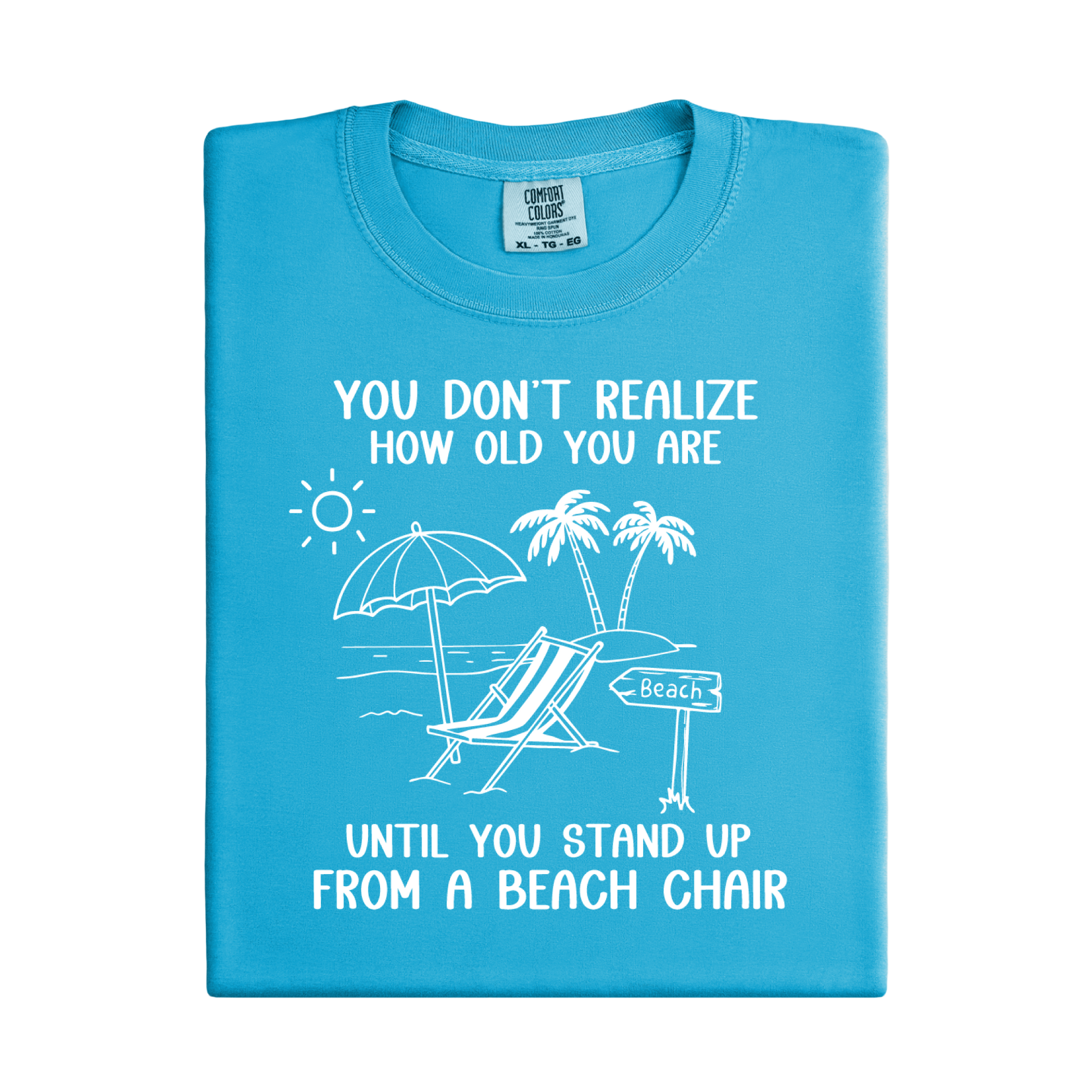 Blue t-shirt with beach-themed graphic and text on a white background