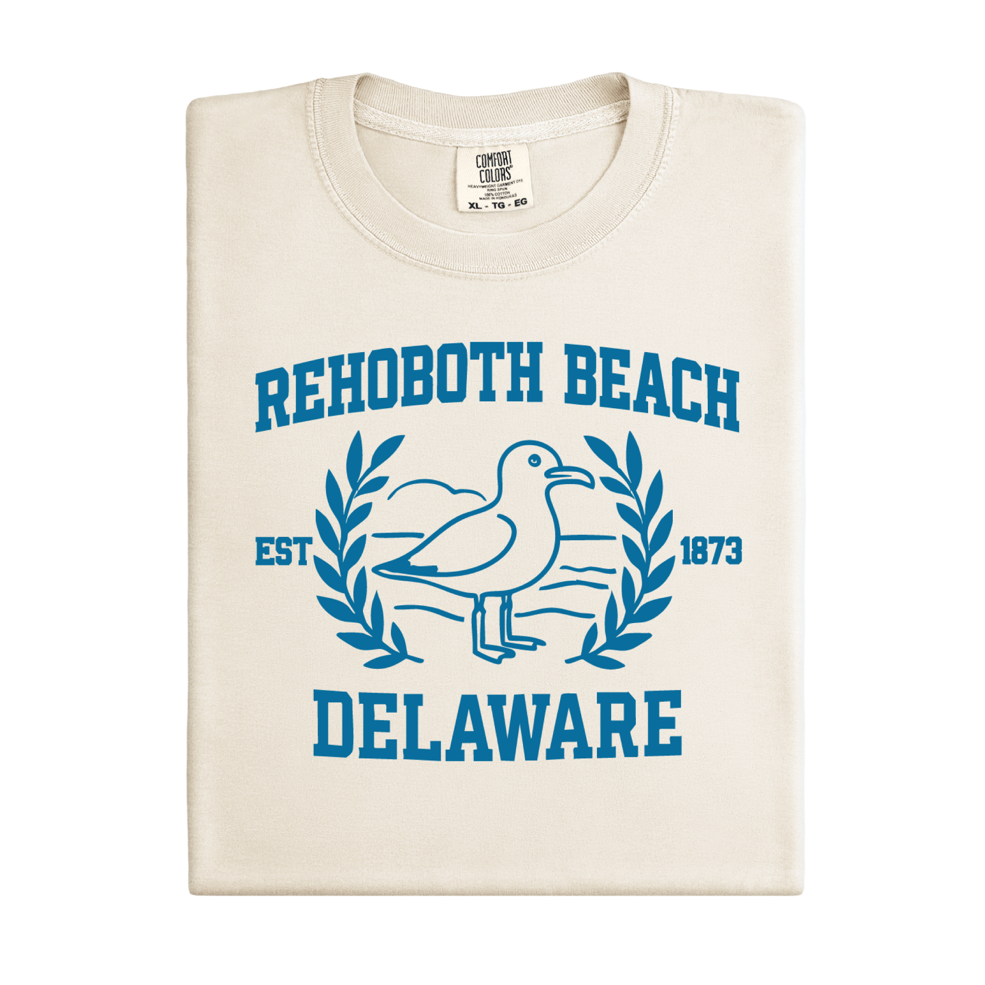 Ivory t-shirt with blue Rehoboth Beach Delaware design on a white background