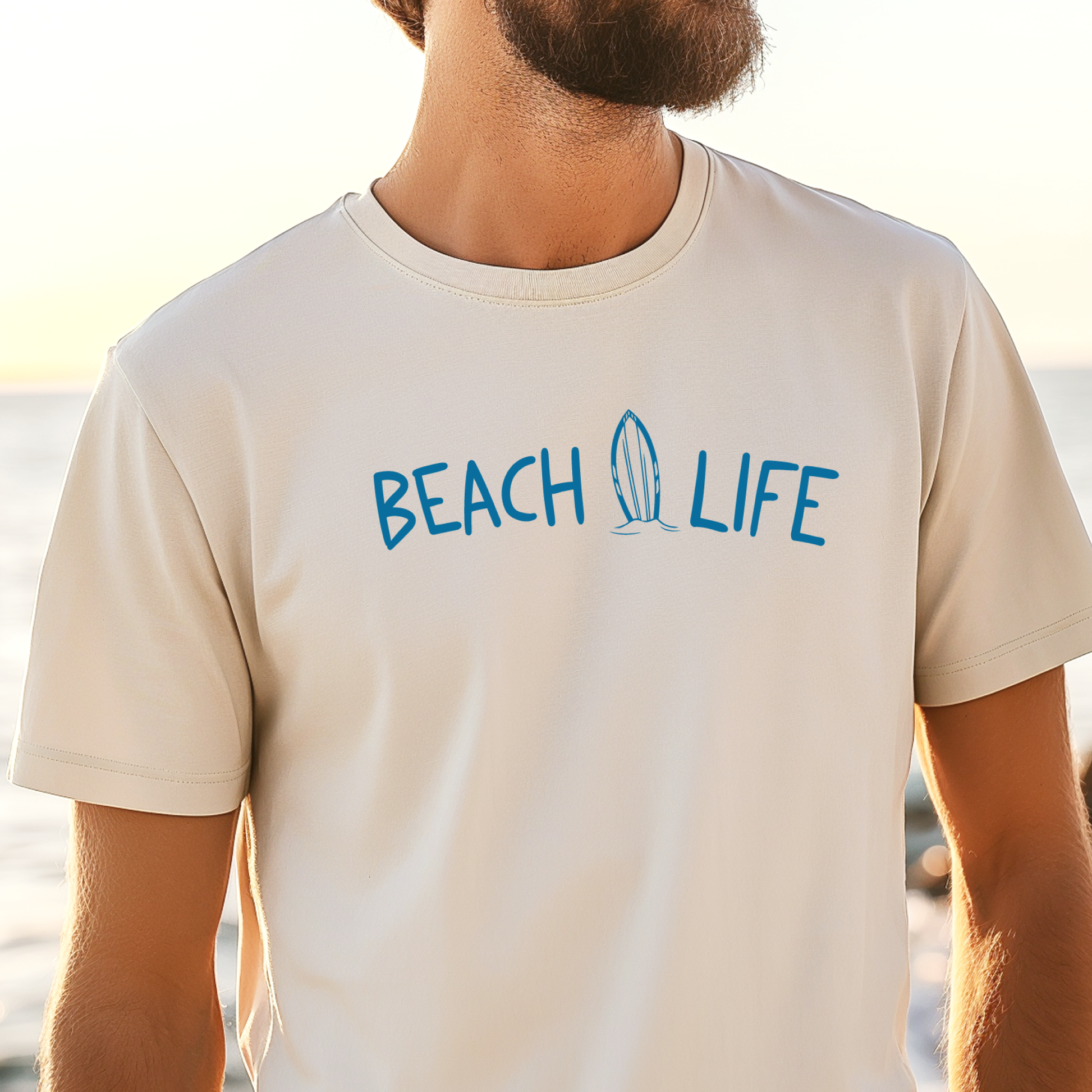 Person wearing a 'Beach Life' t-shirt with a beach background