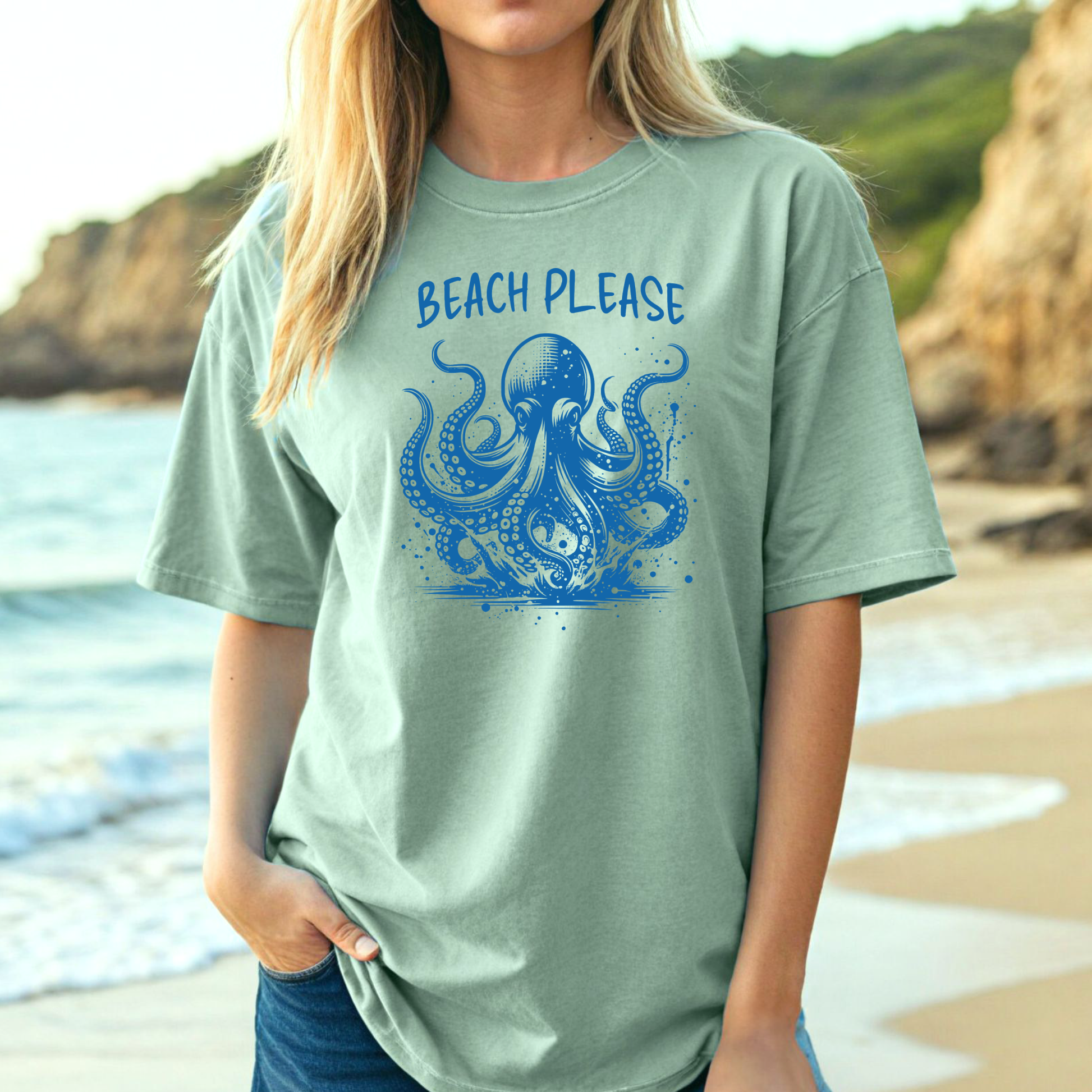 Comfort Colors 1717 "Beach Please" t shirt with a octopus  jumping in water in one color graphic. Picture of a girl on the beach wearing an oversized t shirt.