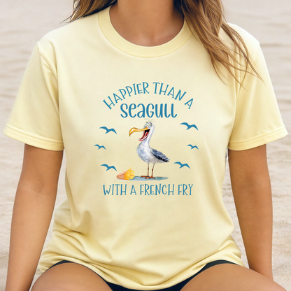 Person wearing a yellow t-shirt with a seagull graphic and text on a neutral background