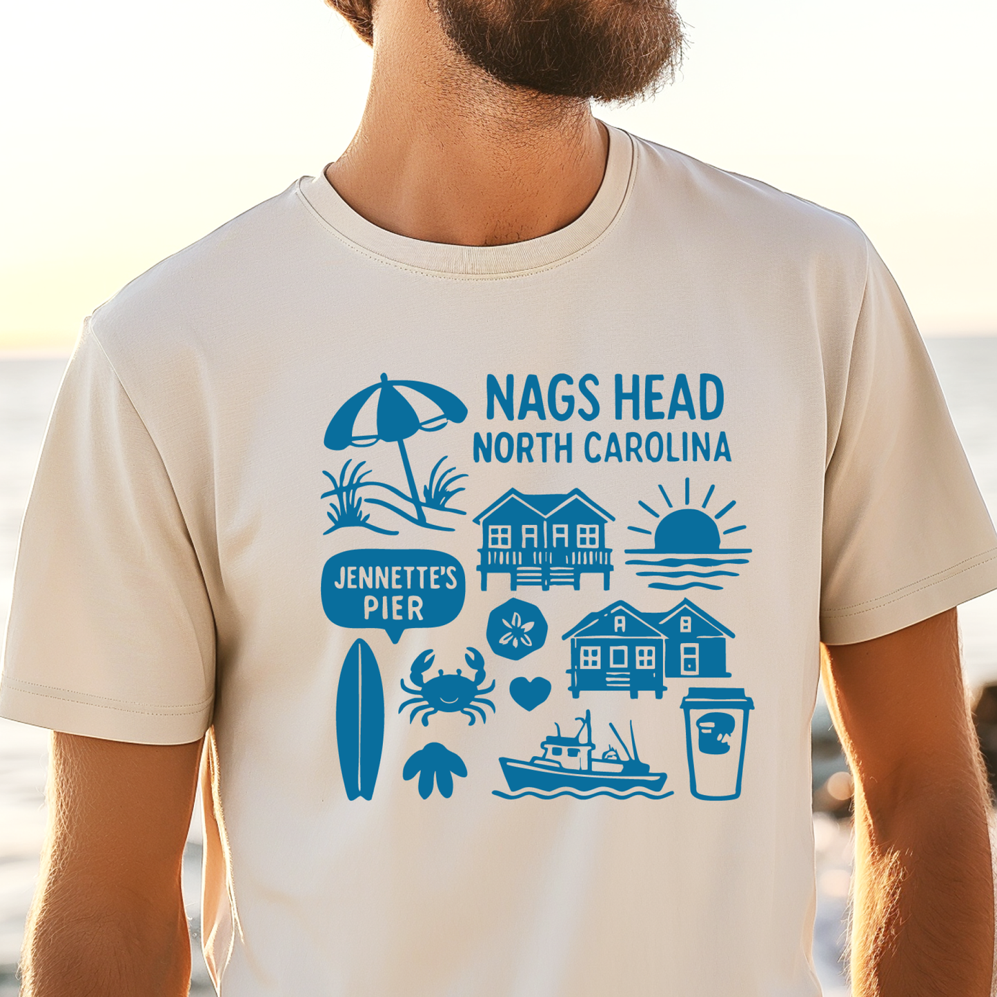 Person wearing a t-shirt with Nags Head, North Carolina, and Jennette's Pier graphics.
