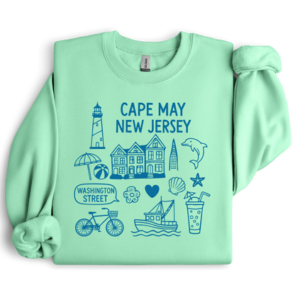 Gildan sweatshirt with blue Cape May New Jersey design featuring beach icons like a lighthouse, dolphin, beach ball, shells, and Washington Street sign. Coastal-inspired pullover made from soft cotton-poly blend fabric, ideal for beach lovers and Cape May fans. Perfect for seaside getaways or relaxing at home, this cozy crewneck celebrates the charm of New Jersey’s iconic coastal town.