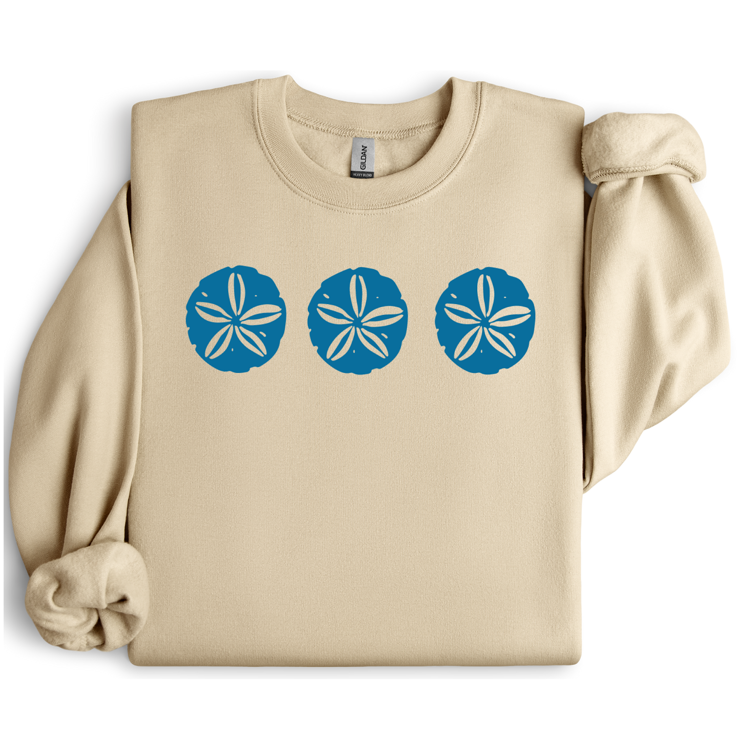Gildan sweatshirt featuring three blue sand dollar graphics printed across the chest. Soft cotton-poly blend fabric with ribbed cuffs and waistband for a cozy, durable fit. Perfect for beach lovers and coastal style enthusiasts who appreciate simple ocean-inspired designs. Ideal for layering on cool seaside evenings or adding a subtle beach vibe to casual outfits.